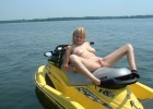 Naughty naked blonde about to do freestyle on jetski with no strings attached