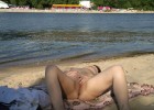 Sleeping exgf caught by camera while rubs her long gigantic clitoris on the beach