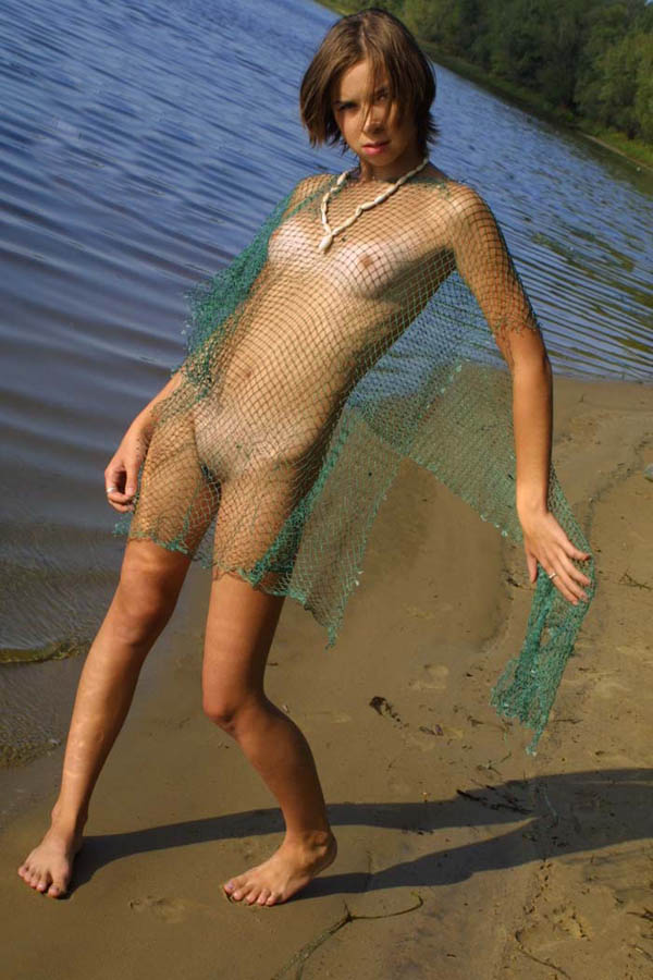 Naturist shy young girl naked in wildness exposing her petite sweet body with small tits and furry slit