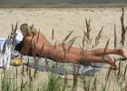 Hot student babe caught naked in the nature while reading a science book