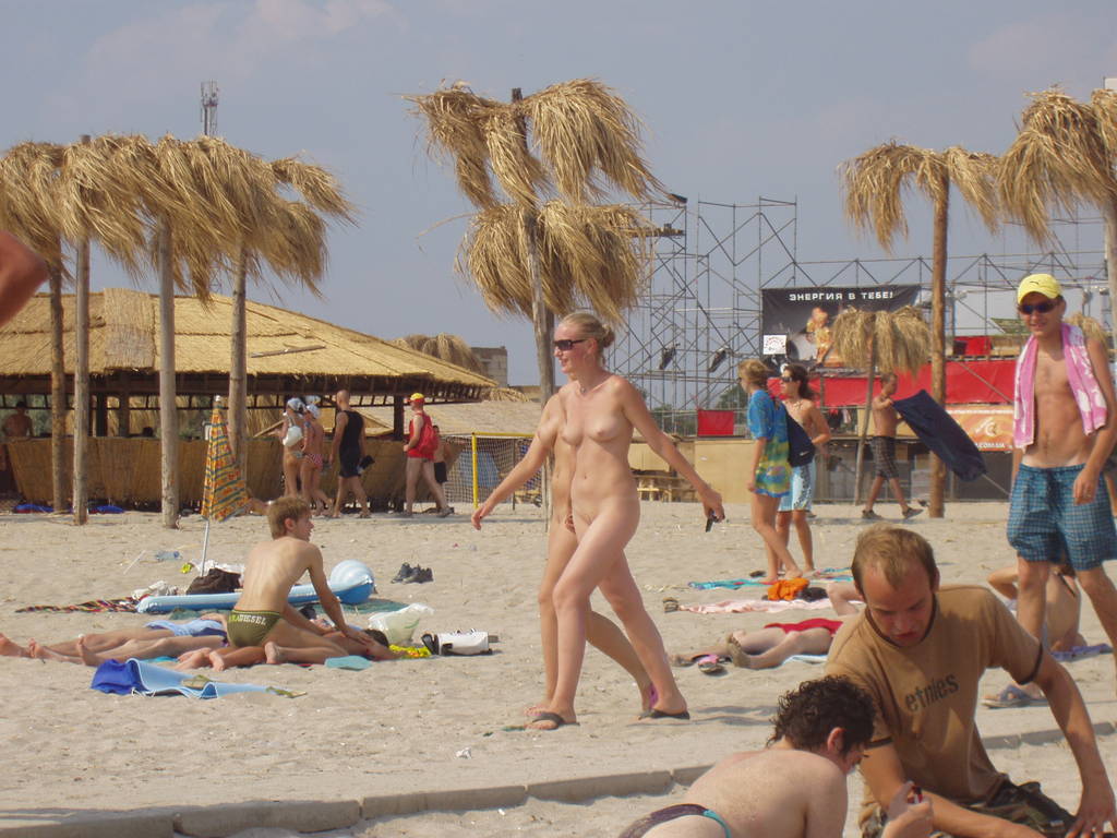 Nude babes caught on wild beach by voyeur photographer
