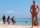 Naked milf poses like shes in a postcard