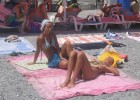 Horny voyeur amused by sunbathing college girls
