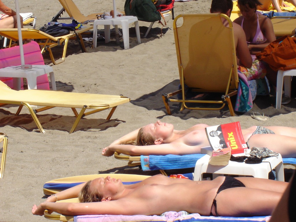 Hot girls sunbathing their perky tits