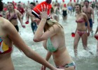 Nice blond wears bikini over her enormous tits on a beach party