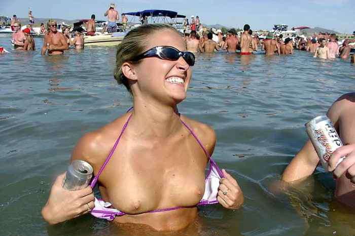 Really sweet teen exposing her tits for the beer can