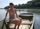 Teen poses naked in boat for our delight