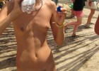 Hairy girl got thirsty on a nudist beach