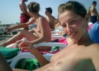 Topless teens on the beach
