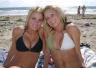 Pierced blondes in bikinis smiling to the camera